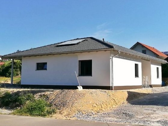 Referenzschreiben zum Bau eines Bungalow 128